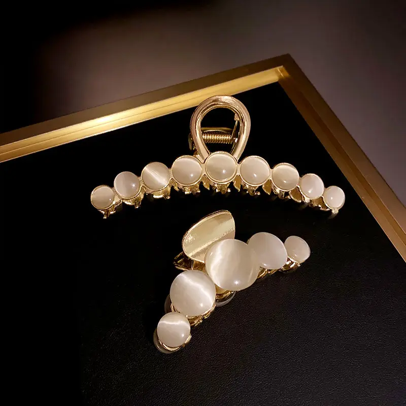 2022 New Cat Eye Hairpin Back Head Grabber Large Korean Style Temperament Hairpin Catch Hairpin Imitation Pearls Clip Headdress
2022 New Cat Eye Hairpin Back Head Grabber Large Korean Style Temperament Hairpin Catch Hairpin Imitation Pearls Clip Headdress