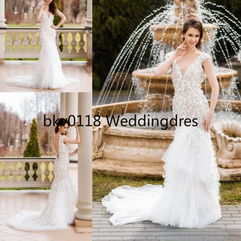 Elegant V Neck Mermaid Wedding Dresses Sleevless Backless Lace Appliques Sexy Bridal Gown Plus Size Saudi Arabia
Elegant V Neck Mermaid Wedding Dresses Sleevless Backless Lace Appliques Sexy Bridal Gown Plus Size Saudi Arabia