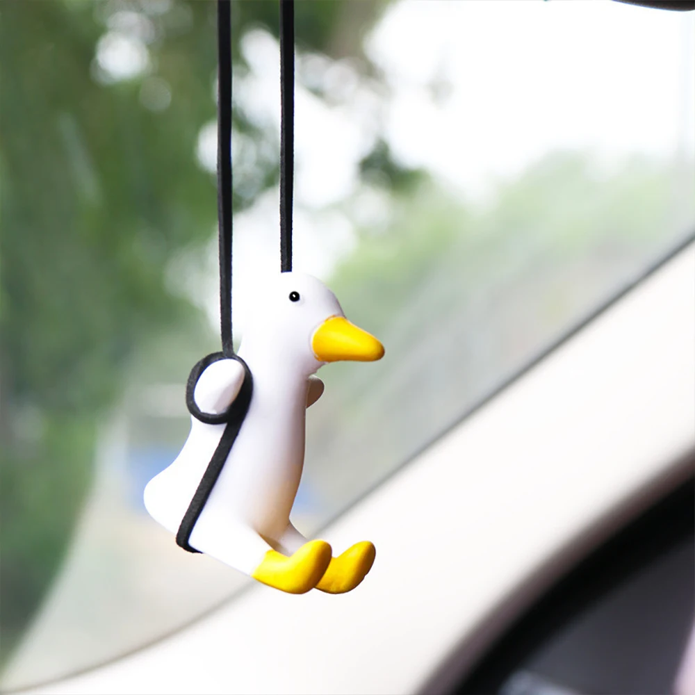 Аниме утка украшение интерьера автомобиля милая гипсовая качающаяся утка с трубкой очки авто зеркало заднего вида подвеска для автомобильных аксессуаров
Аниме утка украшение интерьера автомобиля милая гипсовая качающаяся утка с трубкой очки авто зеркало заднего вида подвеска для автомобильных аксессуаров