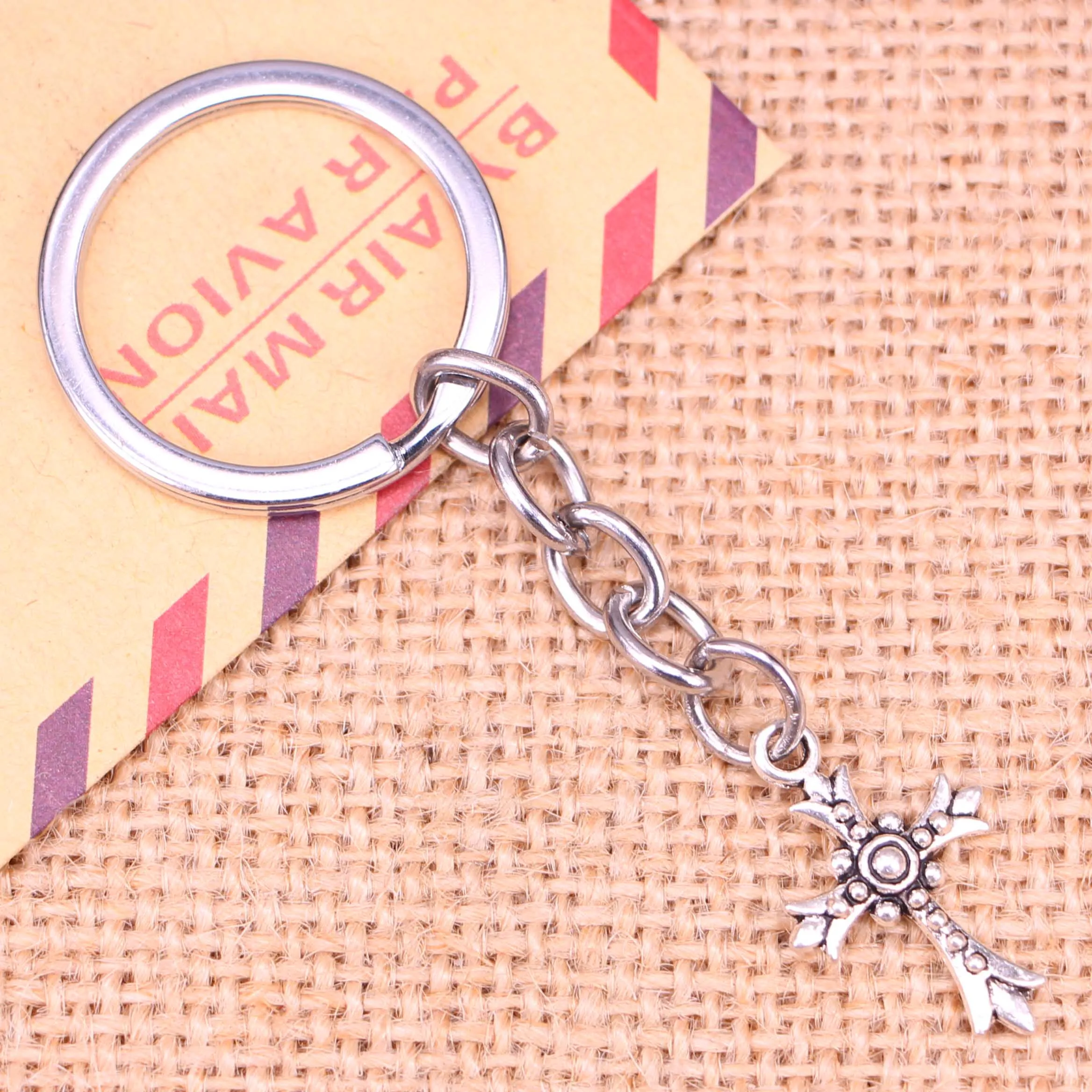 20pcs New Fashion Keychain 24x15mm cross Pendants DIY Men Jewelry Car Key Chain Ring Holder Souvenir For Gift
20pcs New Fashion Keychain 24x15mm cross Pendants DIY Men Jewelry Car Key Chain Ring Holder Souvenir For Gift