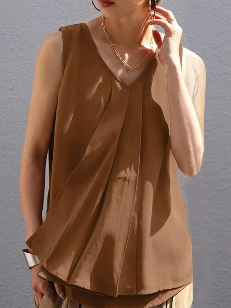 Elegant V-Neck Irregular Loose Blouse Summer Sexy Sleeveless Solid Color Tank Top Office Women Casual Party Pullover Shirt Blusa
Elegant V-Neck Irregular Loose Blouse Summer Sexy Sleeveless Solid Color Tank Top Office Women Casual Party Pullover Shirt Blusa