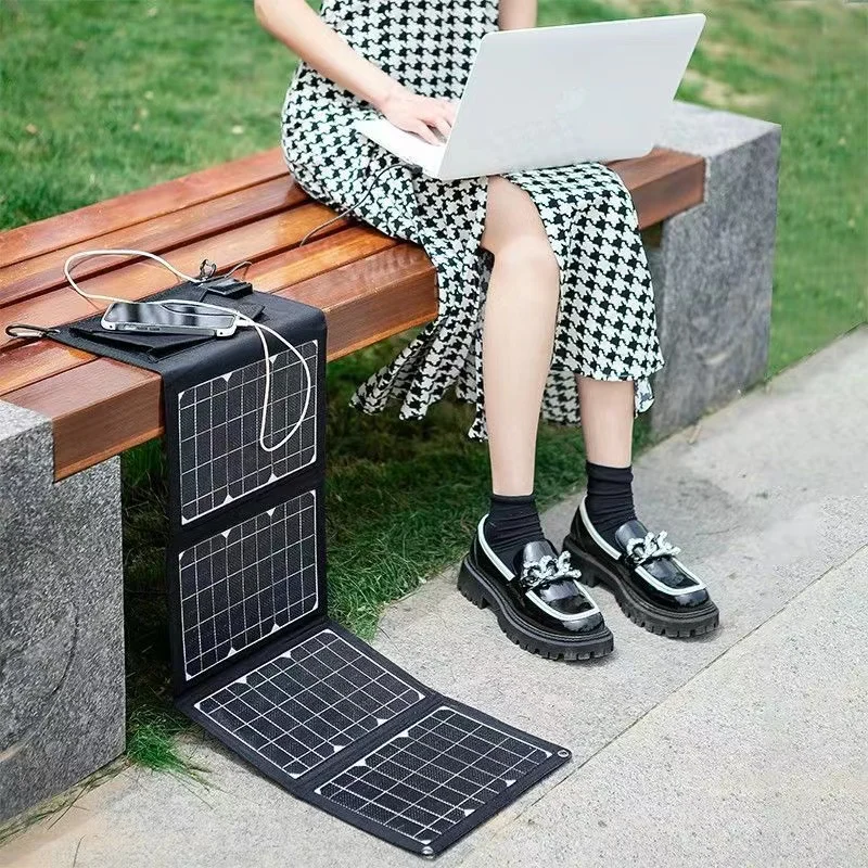 20W 5V Solar Panel Charger Mobile Phone Mobile Power Outdoor Portable Charging Bag.
20W 5V Solar Panel Charger Mobile Phone Mobile Power Outdoor Portable Charging Bag.