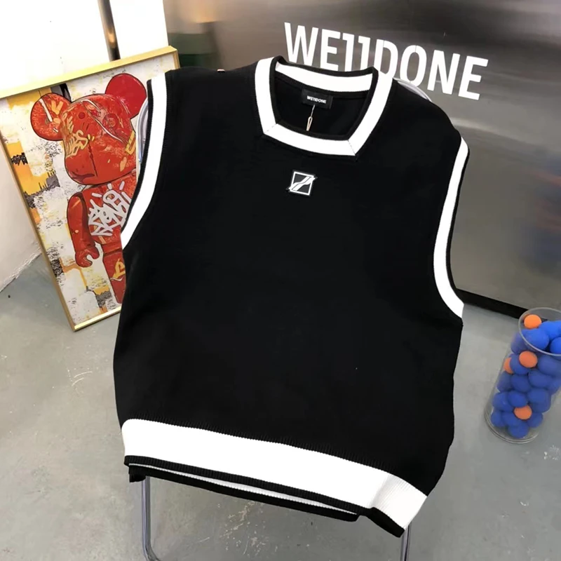 WE11DONE Knitted Vest Stitching College Style Wool Sleeveless Sweater Men Women 1:1 Welldone Sweater
WE11DONE Knitted Vest Stitching College Style Wool Sleeveless Sweater Men Women 1:1 Welldone Sweater