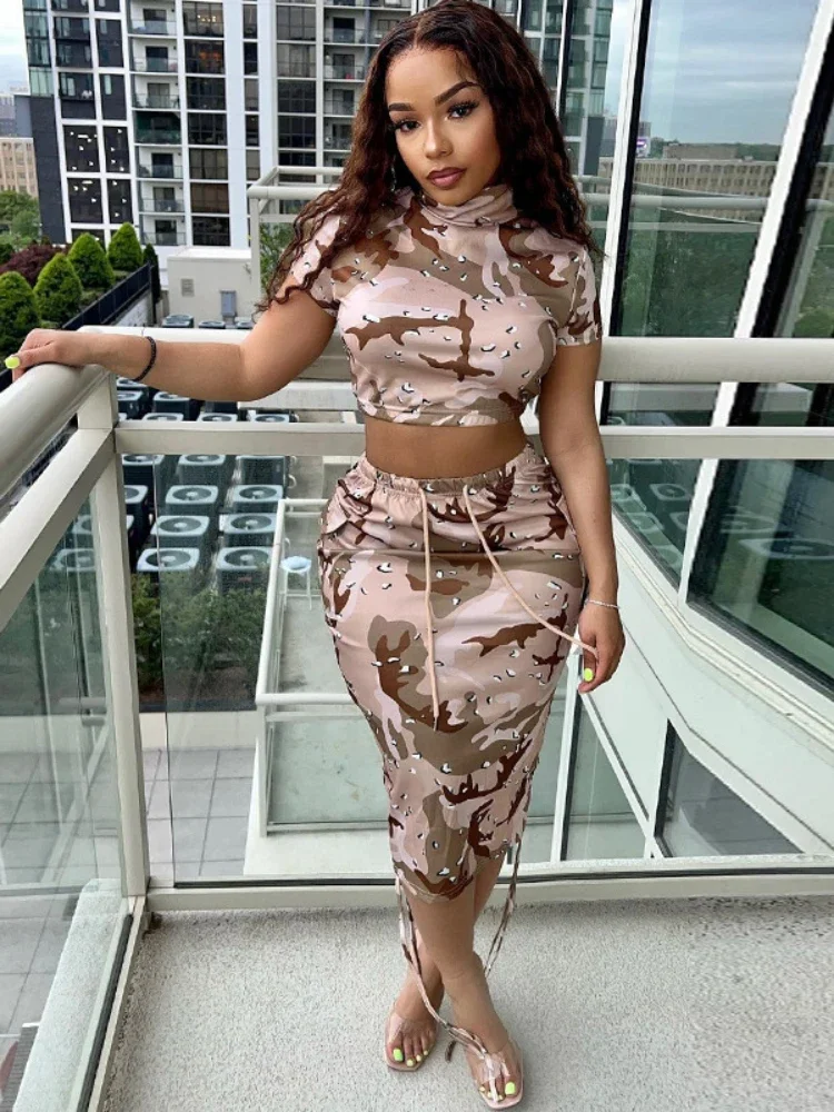 Sexy Camouflage Printed Round Neck Exposed Navel Short Sleeved Top Half Skirt Drawstring Decorative Lace Up Two-piece Set
Sexy Camouflage Printed Round Neck Exposed Navel Short Sleeved Top Half Skirt Drawstring Decorative Lace Up Two-piece Set