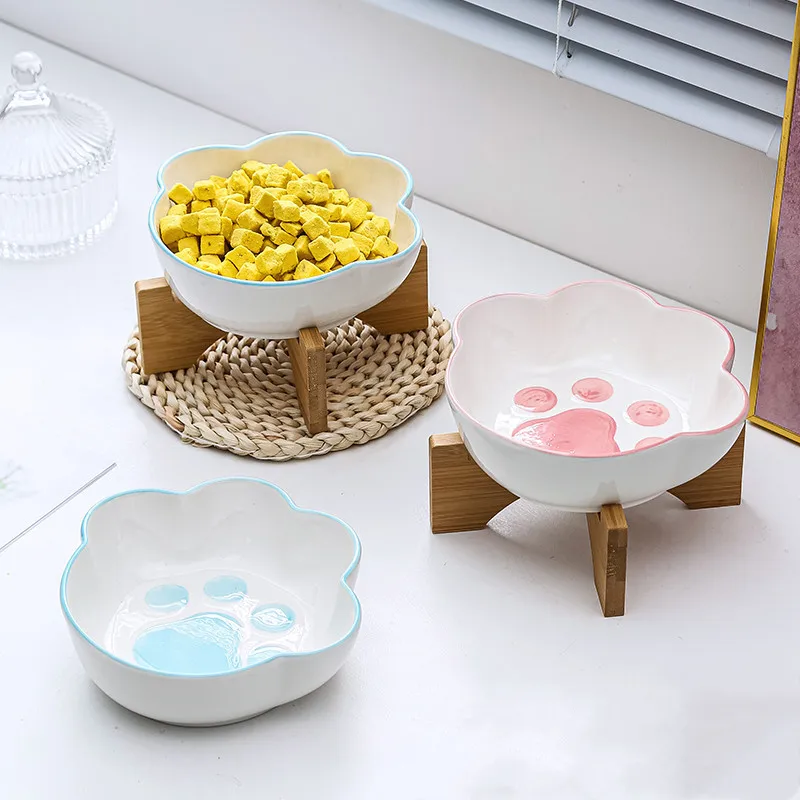 Cute Pet Ceramic Bowl with Bamboo Stand Cat Paw Shape Cat Dog Bowl Pet Drinking Bowl Food Container Cat and Dog Feeding Supplies
Cute Pet Ceramic Bowl with Bamboo Stand Cat Paw Shape Cat Dog Bowl Pet Drinking Bowl Food Container Cat and Dog Feeding Supplies