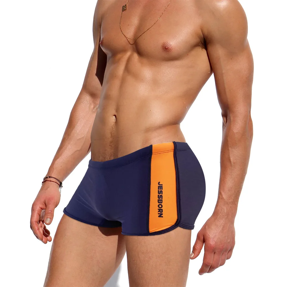 Men New Solid Color Stitching Swimming Trunks European American Fashion Low Waist Side Slit Casual Boxer Swimwear Surfing Sport
Men New Solid Color Stitching Swimming Trunks European American Fashion Low Waist Side Slit Casual Boxer Swimwear Surfing Sport