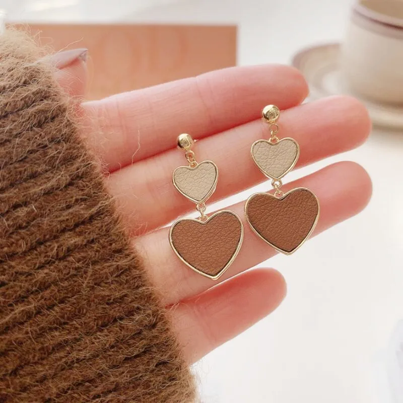 Fashion Simple Coffee Style Heart Drop Earrings For Women Hot Female Jewelry Korean Hanging Love Earrings For Party Gifts 
Fashion Simple Coffee Style Heart Drop Earrings For Women Hot Female Jewelry Korean Hanging Love Earrings For Party Gifts