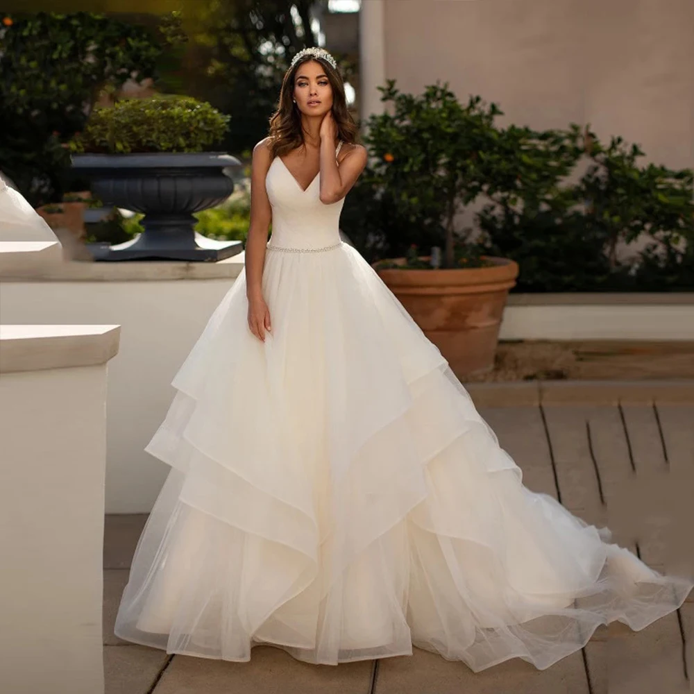 Simple Wedding Dress For Women Spaghetti Straps Sleeveless V-Neck Zipper Backless Bride Gown Tulle Court Train Vestido De Noiva 
Simple Wedding Dress For Women Spaghetti Straps Sleeveless V-Neck Zipper Backless Bride Gown Tulle Court Train Vestido De Noiva