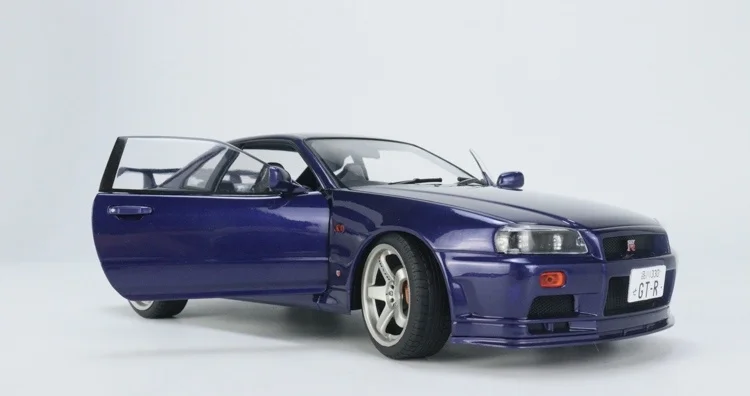 Solido 1 18 Nissan Skyline GT-R R34 1999, Коллекционная модель автомобиля из фиолетового сплава, подарок с орнаментом
Solido 1 18 Nissan Skyline GT-R R34 1999, Коллекционная модель автомобиля из фиолетового сплава, подарок с орнаментом