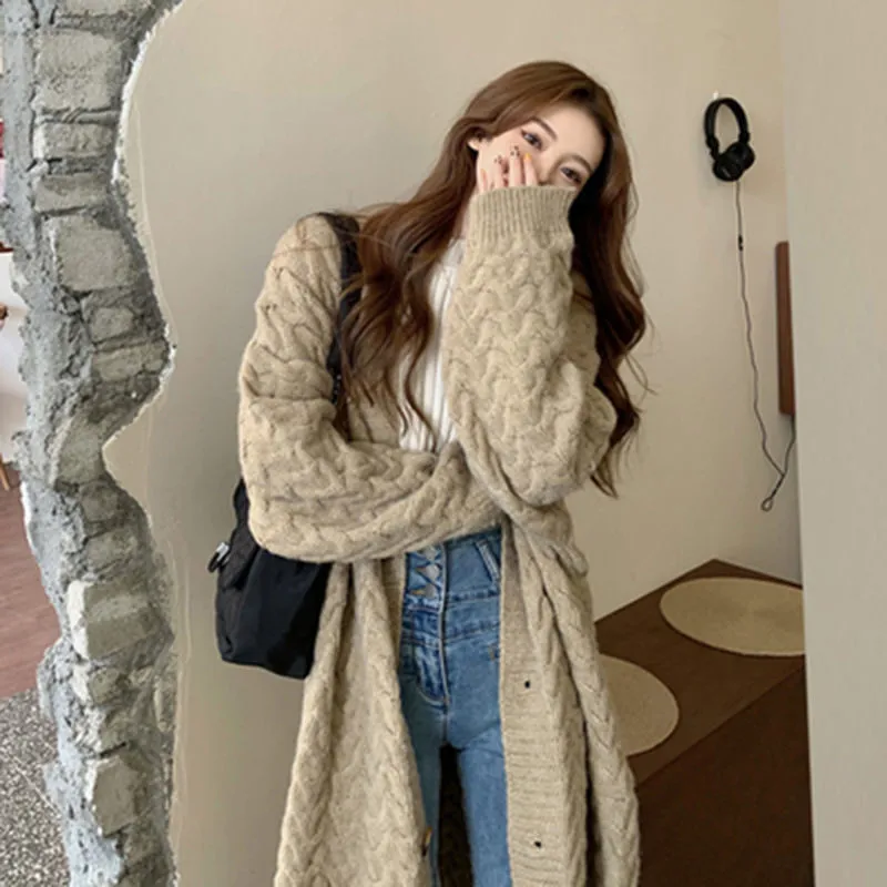 2022 Korean version lazy wind coat large fat sister loose medium length knitted cardigan sweater women's autumn winter
2022 Korean version lazy wind coat large fat sister loose medium length knitted cardigan sweater women's autumn winter