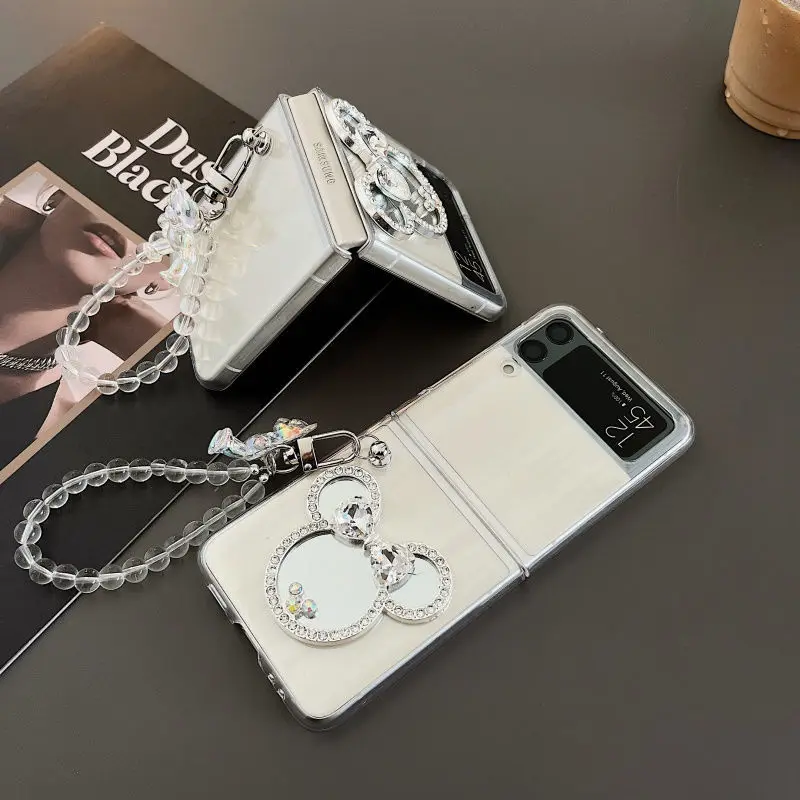 Japanese and Korean Mirror Mickey Bracelet Suitable for Samsung Z Flip 3 Phone Case ZFlip1/2 Folding Screen Protective Case
Japanese and Korean Mirror Mickey Bracelet Suitable for Samsung Z Flip 3 Phone Case ZFlip1/2 Folding Screen Protective Case