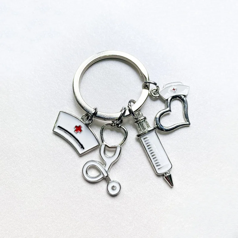 New Products Hot Selling Fashion Trend Jewelry Peach Heart Nurse Cap Syringe Syringe Stethoscope Keychain Medical Keychain
New Products Hot Selling Fashion Trend Jewelry Peach Heart Nurse Cap Syringe Syringe Stethoscope Keychain Medical Keychain