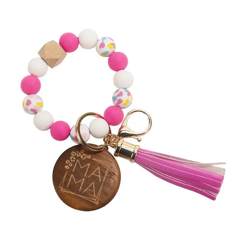 2023 New Design Mama Bracelet Keychain Custom Beaded Wrist Silicone Bead Cow Wristlet Keyring With Wood Disc Tassel Charm Gift
2023 New Design Mama Bracelet Keychain Custom Beaded Wrist Silicone Bead Cow Wristlet Keyring With Wood Disc Tassel Charm Gift