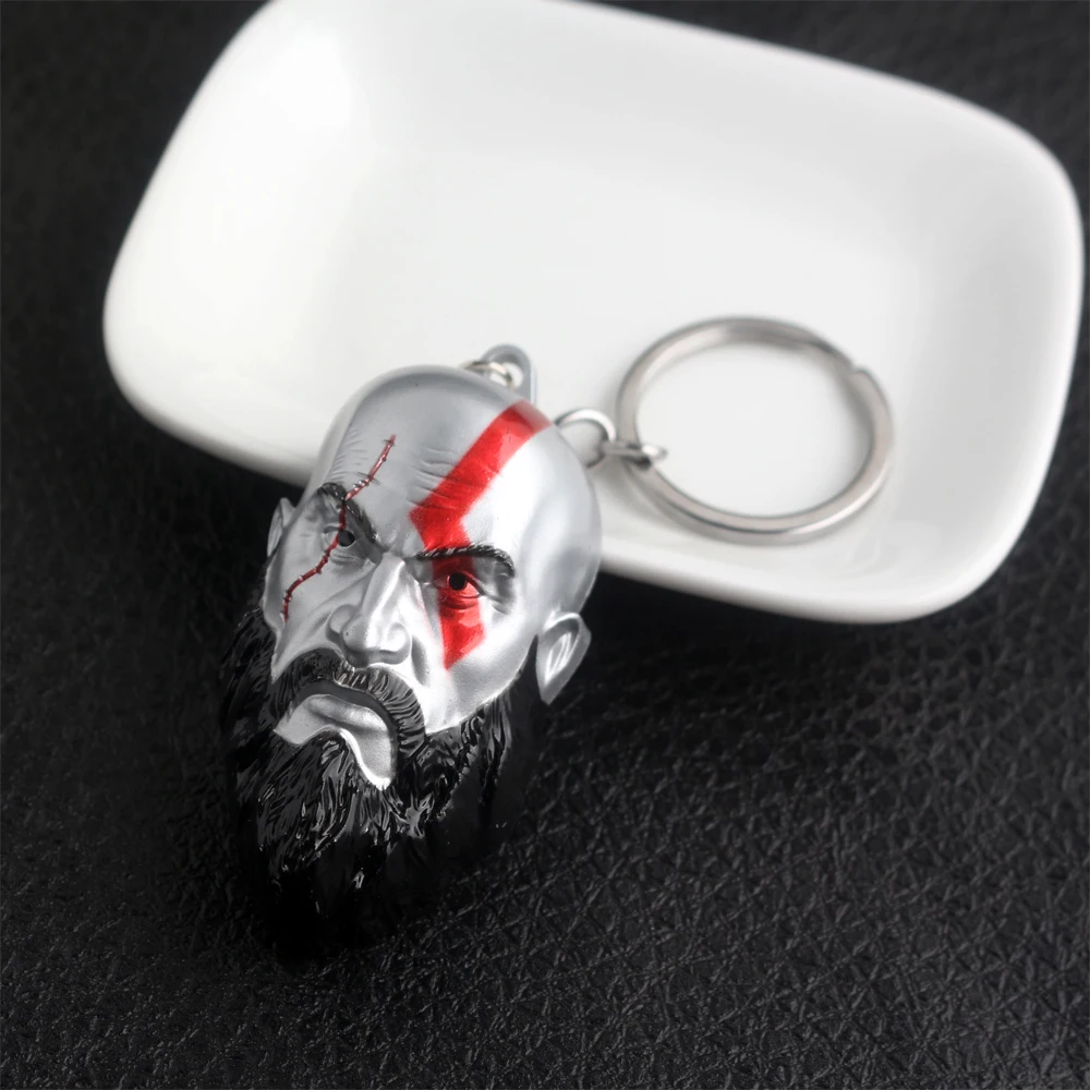God of War Ragnarok Kratos 3D Head Mask Keychain Leviathan Axe Blades of Chaos Metal Key Chain Weapon Pendant Keyring Jewelry
God of War Ragnarok Kratos 3D Head Mask Keychain Leviathan Axe Blades of Chaos Metal Key Chain Weapon Pendant Keyring Jewelry