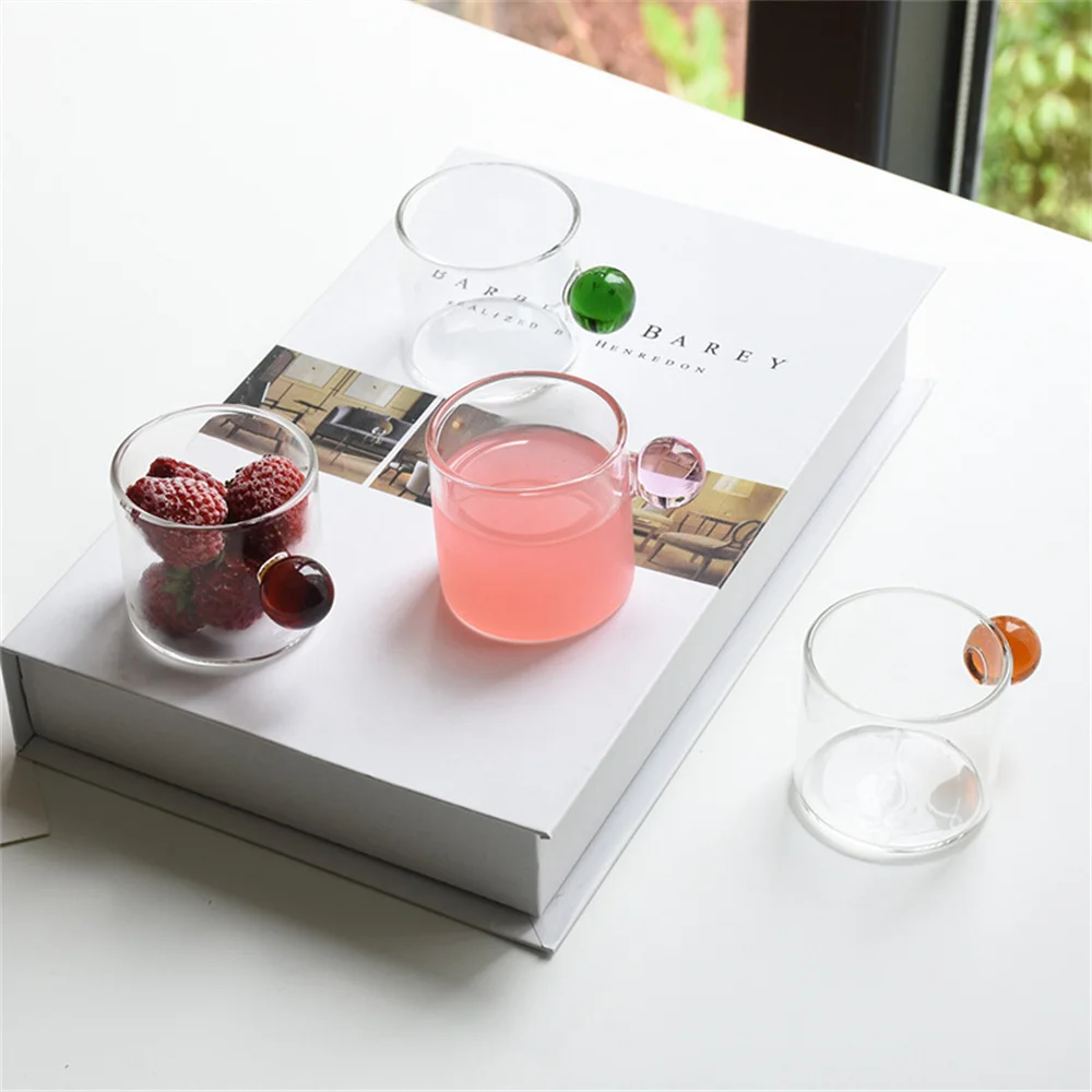 Manually Pressed Cute Glass Cups Lovely Appearance With Handle Transparent Mug Household Round Handle Glass Drinkware
Manually Pressed Cute Glass Cups Lovely Appearance With Handle Transparent Mug Household Round Handle Glass Drinkware