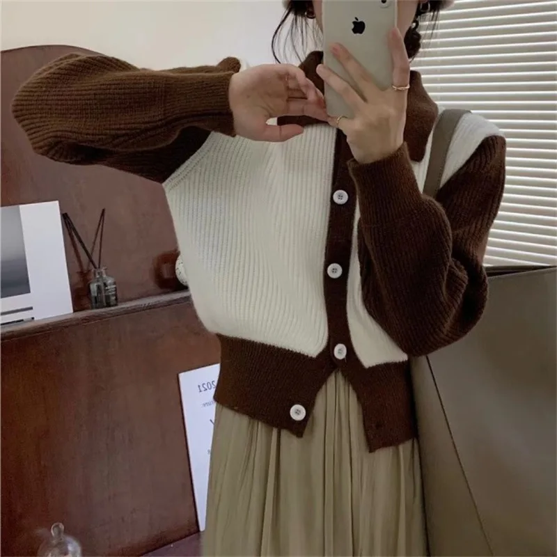 Colored polo neck sweater jacket Women's fashion loose fitting age reducing knitted cardigan top thickened
Colored polo neck sweater jacket Women's fashion loose fitting age reducing knitted cardigan top thickened