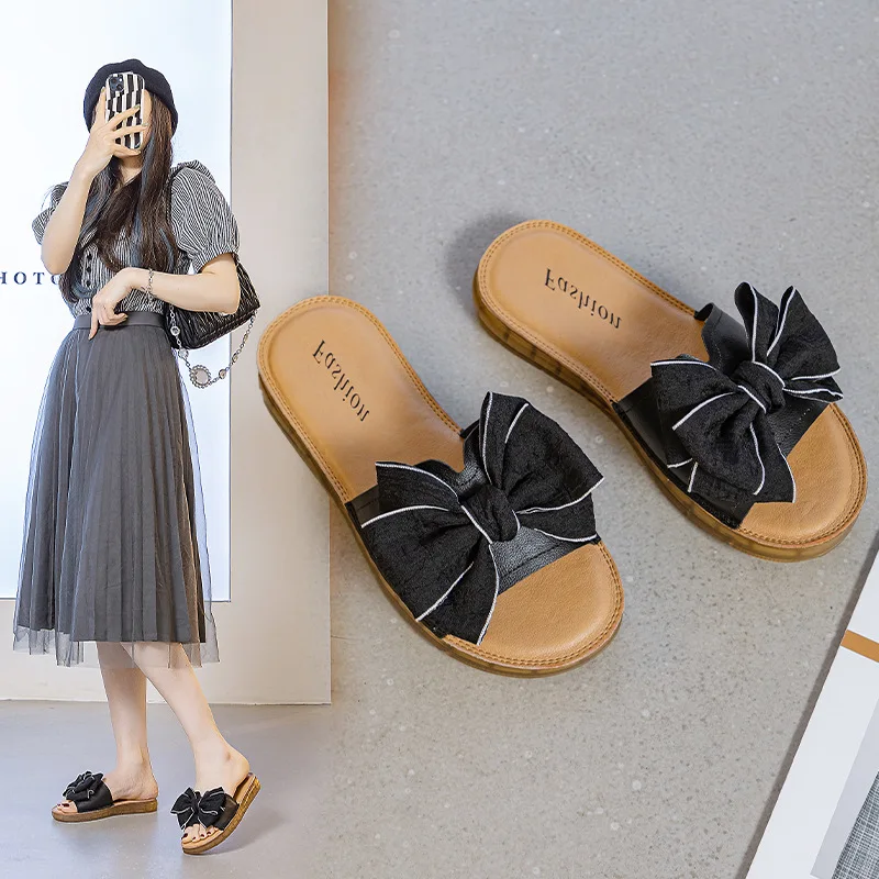 Flat bottomed sandals for women's summer outerwear 2023 new breathable top layer cowhide bow soft sole lightweight beach shoes
Flat bottomed sandals for women's summer outerwear 2023 new breathable top layer cowhide bow soft sole lightweight beach shoes