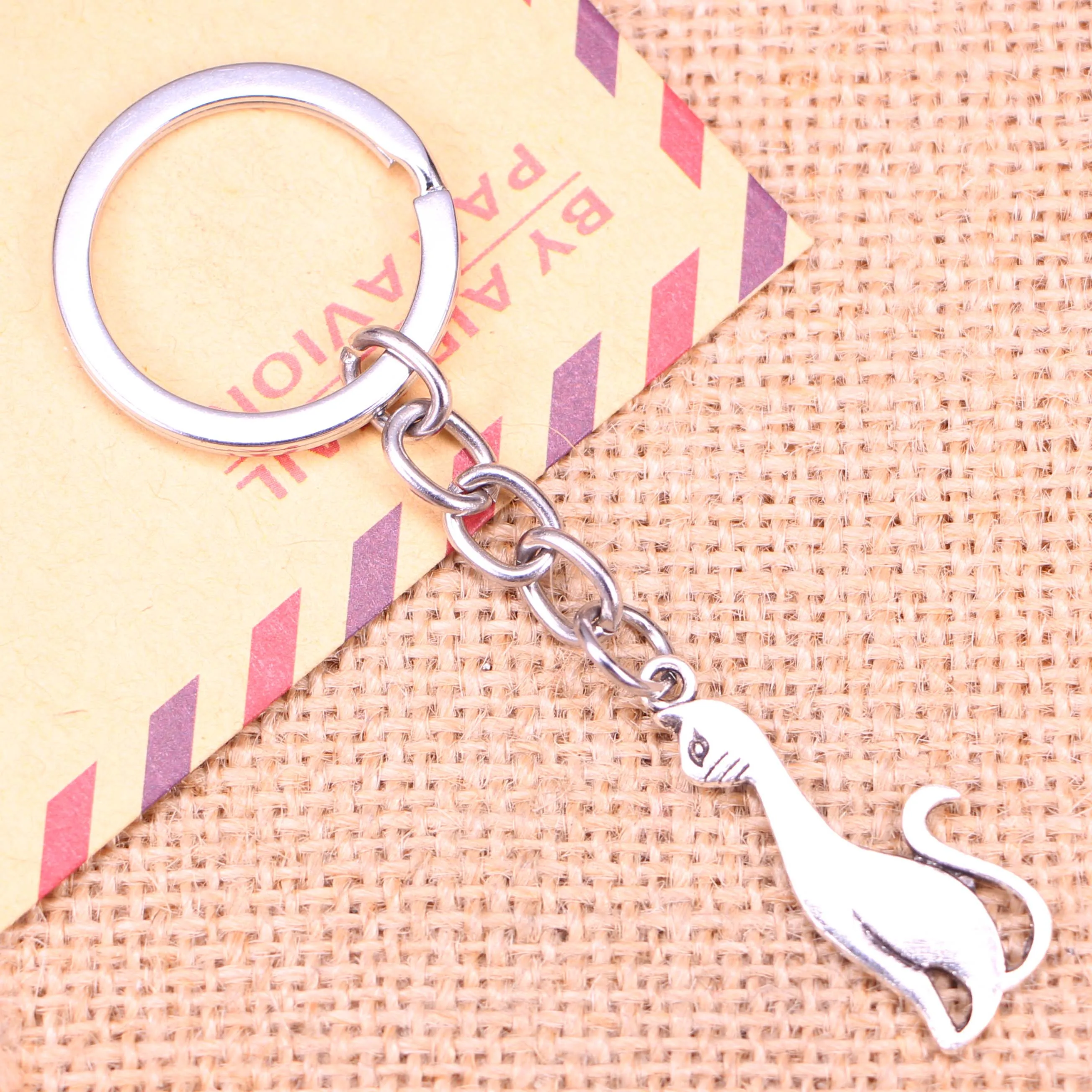 20pcs New Fashion Keychain 34x14mm cat Pendants DIY Men Jewelry Car Key Chain Ring Holder Souvenir For Gift
20pcs New Fashion Keychain 34x14mm cat Pendants DIY Men Jewelry Car Key Chain Ring Holder Souvenir For Gift