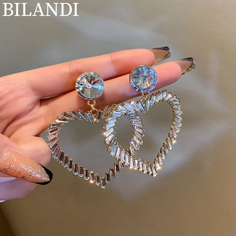 Bilandi S925 needle Women Jewelry Heart Earrings Delicate Design Zircon Crystal Zircon Drop Earrings For Women Accessories
Bilandi S925 needle Women Jewelry Heart Earrings Delicate Design Zircon Crystal Zircon Drop Earrings For Women Accessories