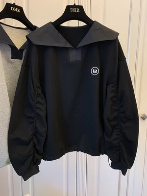 Ladies navy style loose casual stitching embroidery letters drawstring long-sleeved top 
Ladies navy style loose casual stitching embroidery letters drawstring long-sleeved top