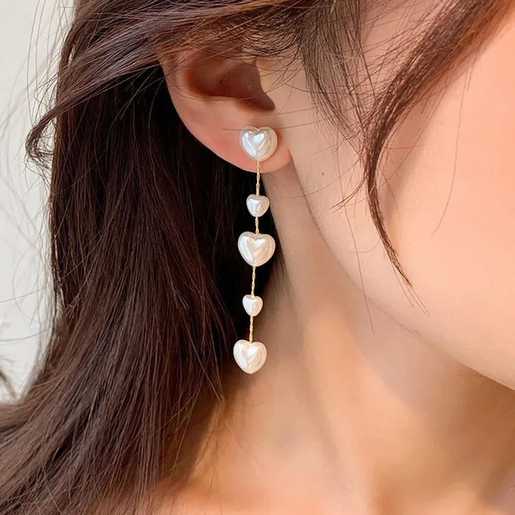 Design Long Heart Earrings for Women Retro Simple and Temperament Fashion Jewelry
Design Long Heart Earrings for Women Retro Simple and Temperament Fashion Jewelry