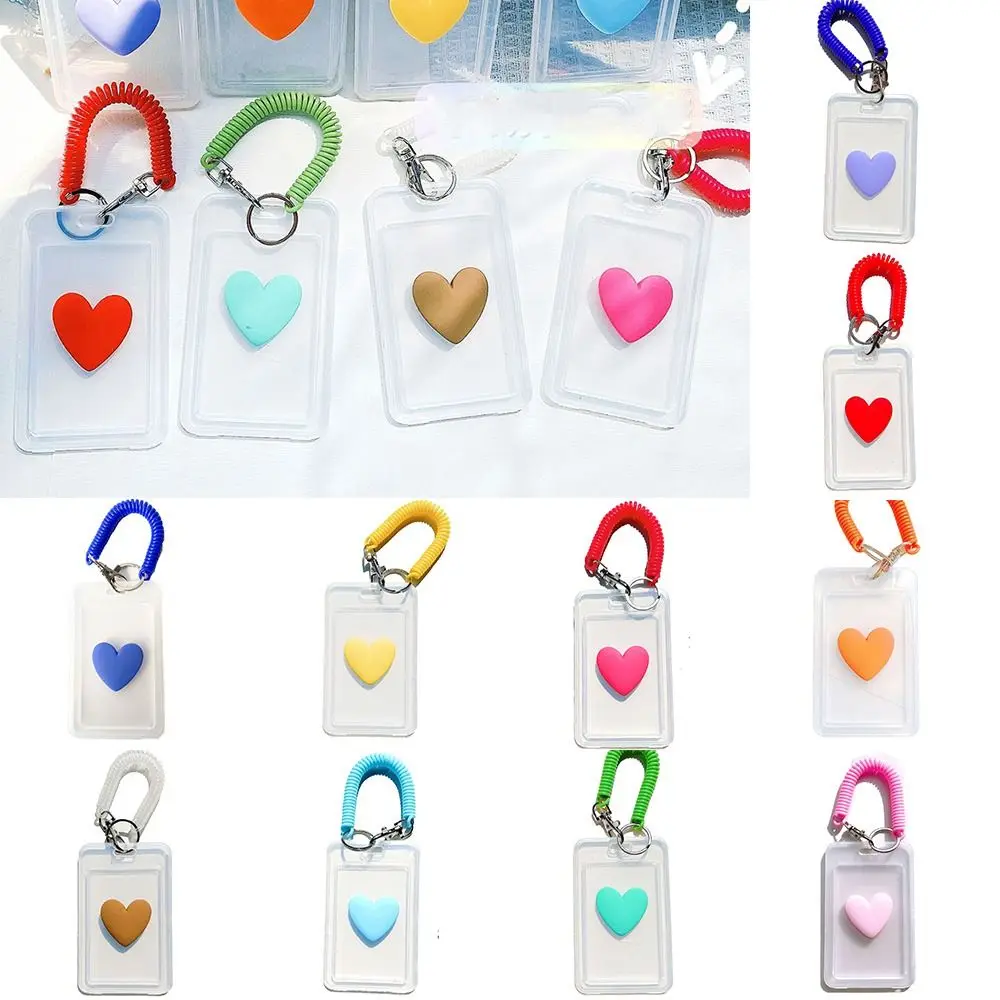 Прозрачный пластиковый эластичный Чехол для карт Love Heart, Женский Чехол для карт в Корейском стиле с брелоком, защитный чехол для карт доступа
Прозрачный пластиковый эластичный Чехол для карт Love Heart, Женский Чехол для карт в Корейском стиле с брелоком, защитный чехол для карт доступа
