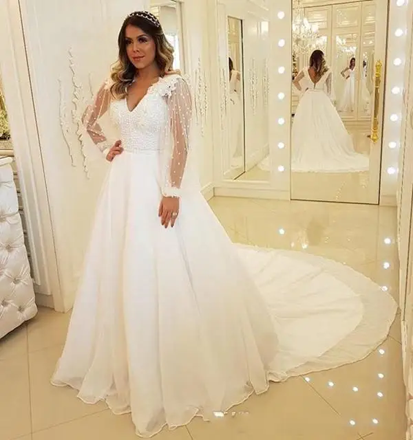 Stunning A-Line Deep V Neck Illsion Long Sleeves Wedding Dresses Sweep Train Lace Appliques Backless Cheap Bridal Gowns
Stunning A-Line Deep V Neck Illsion Long Sleeves Wedding Dresses Sweep Train Lace Appliques Backless Cheap Bridal Gowns