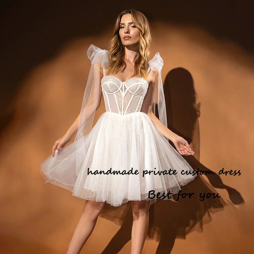 Sparkly Tulle Short Wedding Party Dresses Bow Straps Corset Sweetheart Bridal Gowns Above Knee Lace Up Back
Sparkly Tulle Short Wedding Party Dresses Bow Straps Corset Sweetheart Bridal Gowns Above Knee Lace Up Back
