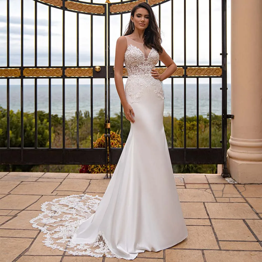 Mermaid Wedding Dress Scoop Sleeveless Applique Illusion Outdoor Bridal Gowns Buttons Court Train Sexy Beach Wedding Dresses
Mermaid Wedding Dress Scoop Sleeveless Applique Illusion Outdoor Bridal Gowns Buttons Court Train Sexy Beach Wedding Dresses
