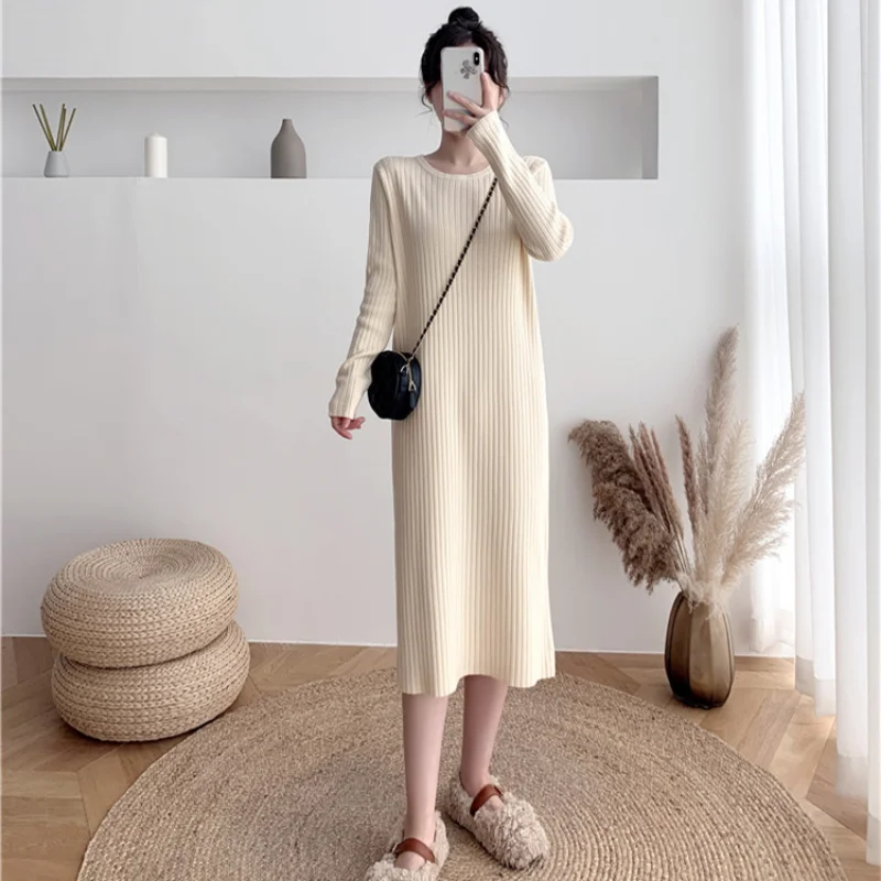 Women's solid color knitted long-sleeved dress temperament commuting loose medium and long sweater casual fashion bottom skirt
Women's solid color knitted long-sleeved dress temperament commuting loose medium and long sweater casual fashion bottom skirt