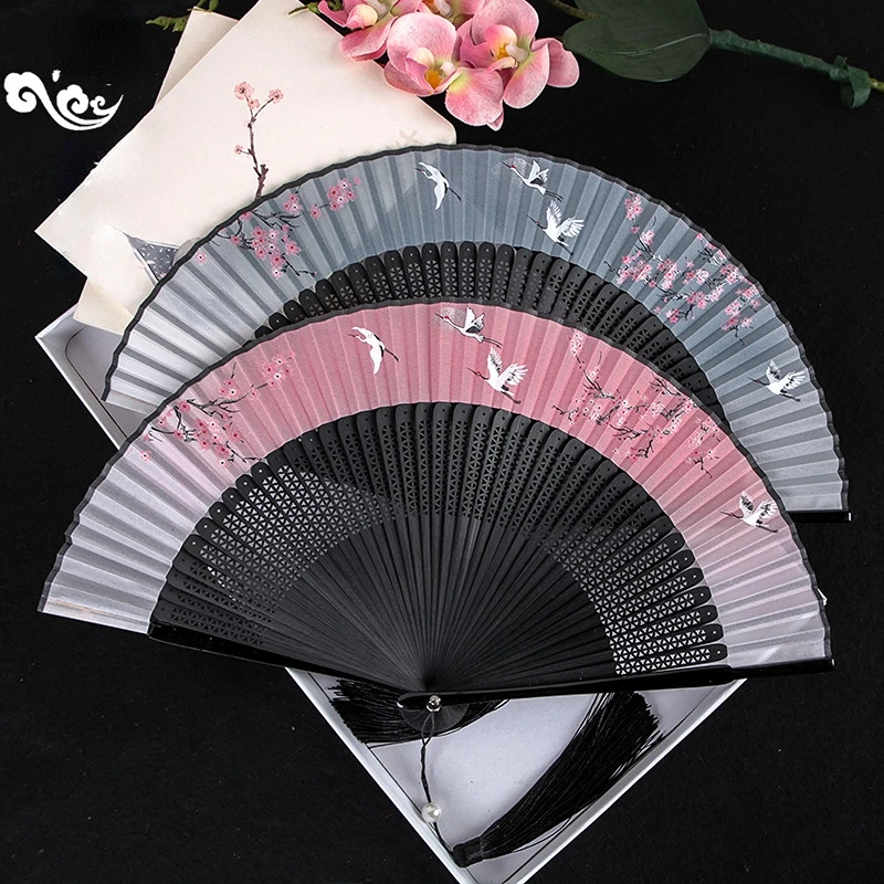 new antique folding fan print female fan fairy crane plum blossom on the new multi-color folding fan fan dance fan send tassels
new antique folding fan print female fan fairy crane plum blossom on the new multi-color folding fan fan dance fan send tassels