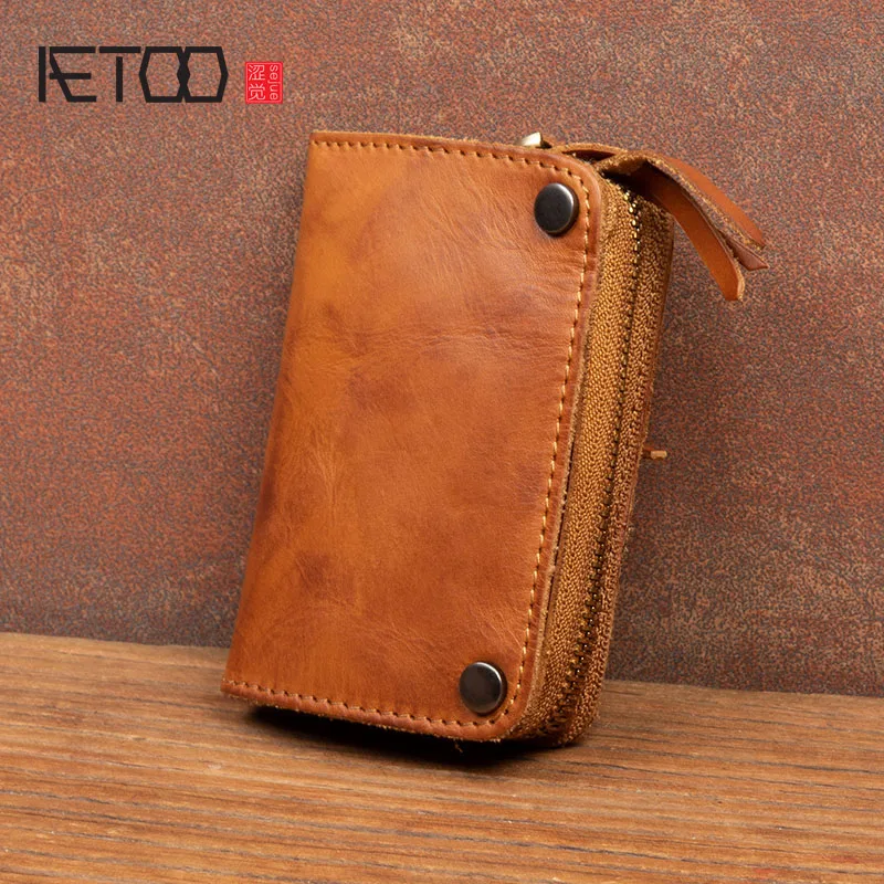 AETOO Men's leather car key case, large-capacity vegetable tanned leather coin purse, first layer leather wallet
AETOO Men's leather car key case, large-capacity vegetable tanned leather coin purse, first layer leather wallet
