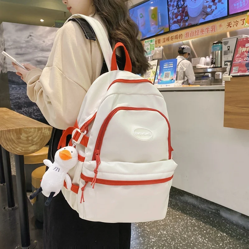 Школьный ранец для женщин и студентов колледжа, нейлоновый простой рюкзак с защитой от кражи, спортивная сумка на плечо для подростков 
Школьный ранец для женщин и студентов колледжа, нейлоновый простой рюкзак с защитой от кражи, спортивная сумка на плечо для подростков