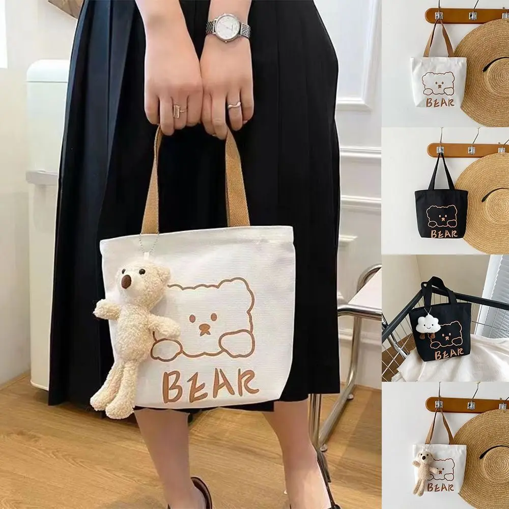 Korean Style Canvas Handbag Cute Large Capacity Bear Printing Tote Bag Cloud Pendant Bear Pendant Lunch Bag Women
Korean Style Canvas Handbag Cute Large Capacity Bear Printing Tote Bag Cloud Pendant Bear Pendant Lunch Bag Women