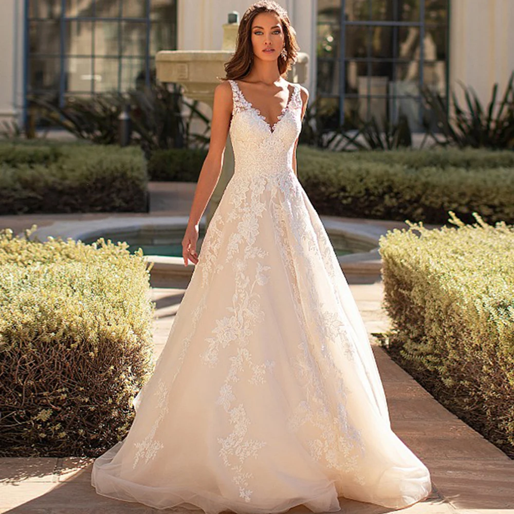 Classic Wedding Dresses V-Neck Sleeveless Tulle Dress A-Line Lace Appliques Backless Sweep Train Simple Bridal Gowns платье 2022
Classic Wedding Dresses V-Neck Sleeveless Tulle Dress A-Line Lace Appliques Backless Sweep Train Simple Bridal Gowns платье 2022