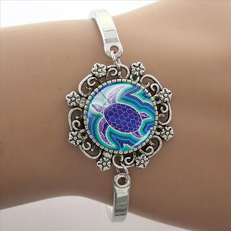 TAFREE Sea Turtle Lace Design Metal Bracelets 15mm Kangaroo Round Glass Dome Bangle Adjustable Size Unisex FJ01
TAFREE Sea Turtle Lace Design Metal Bracelets 15mm Kangaroo Round Glass Dome Bangle Adjustable Size Unisex FJ01