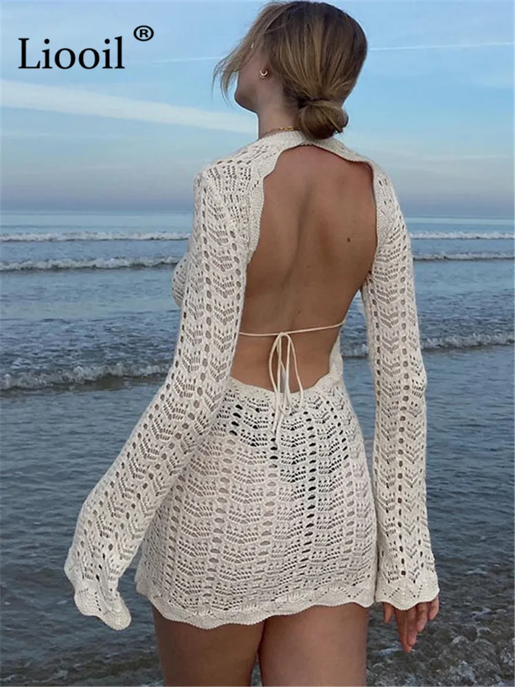 Sexy Backless Knitted Bodycon Mini Dress Women High Waist Long Sleeve Hollow Out Holiday Party Black White Beach Short Dresses
Sexy Backless Knitted Bodycon Mini Dress Women High Waist Long Sleeve Hollow Out Holiday Party Black White Beach Short Dresses