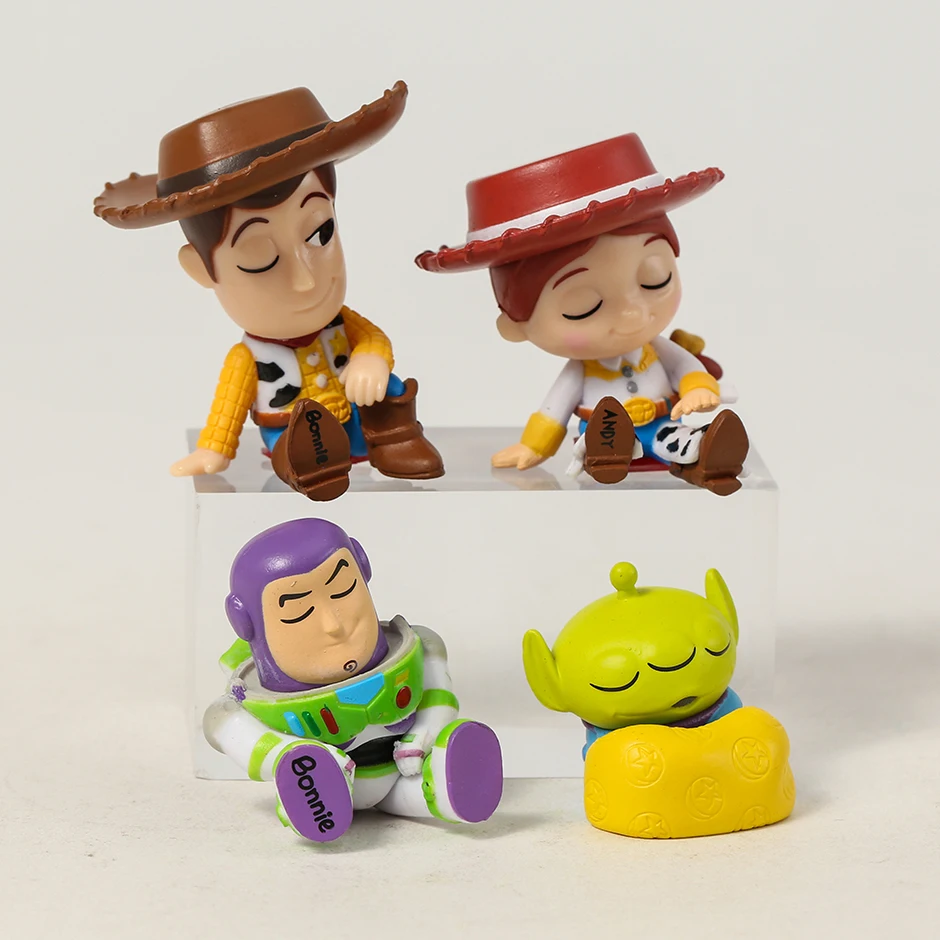 

4pcs 4cm Toy Story Sleeping Woody Buzz Lightyear Jessie Alien Mini PVC Decoration Figures Collectible Model Dolls