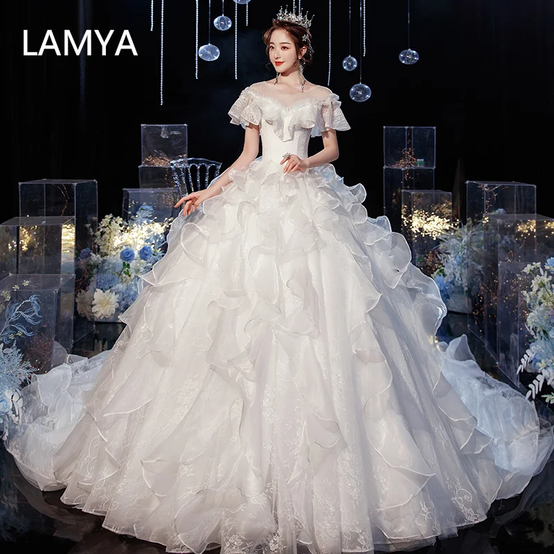 LAMYA Tiered Ball Gown Wedding Dresses O Neck Vestido Casamento Lace Up Appliqus Draped Bride Gowns 2022 Suknie Ruched Princess
LAMYA Tiered Ball Gown Wedding Dresses O Neck Vestido Casamento Lace Up Appliqus Draped Bride Gowns 2022 Suknie Ruched Princess