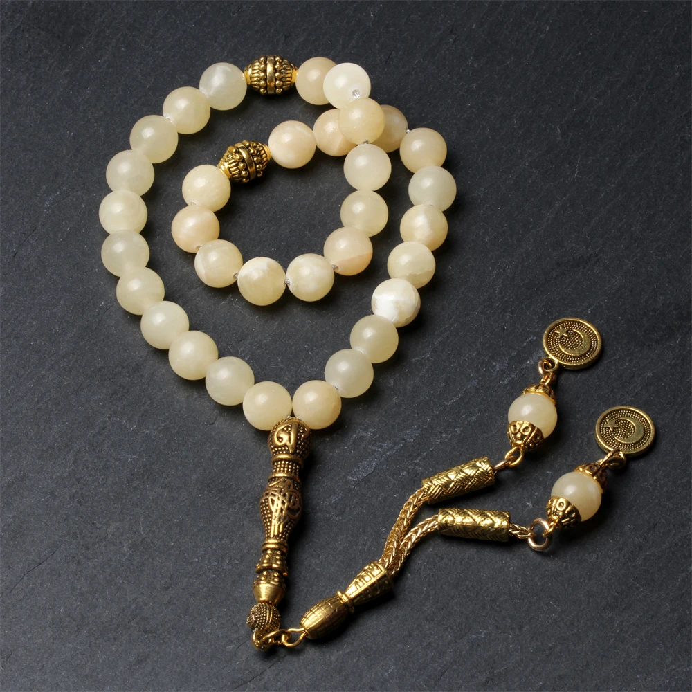 Handmade natural beige jade round beads gold tassel muslim tasbih misbaha
Handmade natural beige jade round beads gold tassel muslim tasbih misbaha