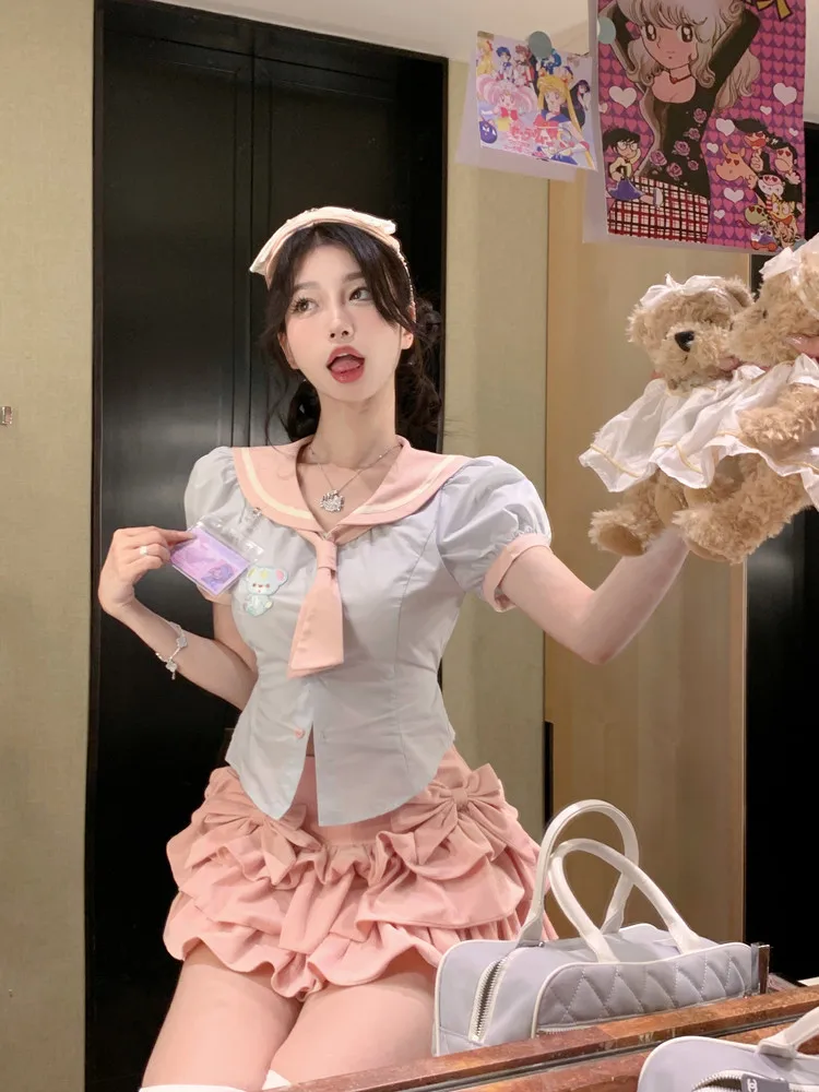 Комплект из 2 предметов, рубашка с рукавами-фонариками и мини-юбка с оборками 
Комплект из 2 предметов, рубашка с рукавами-фонариками и мини-юбка с оборками