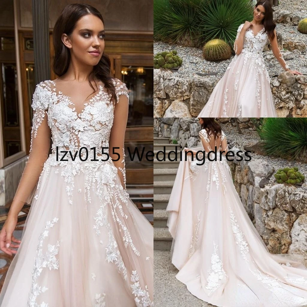 2022 Pearl Pink Illusion Design Wedding Dresses Crystal Lace Appliques Long Sleeves Sexy Back With Covered Button Bridal Gowns
2022 Pearl Pink Illusion Design Wedding Dresses Crystal Lace Appliques Long Sleeves Sexy Back With Covered Button Bridal Gowns
