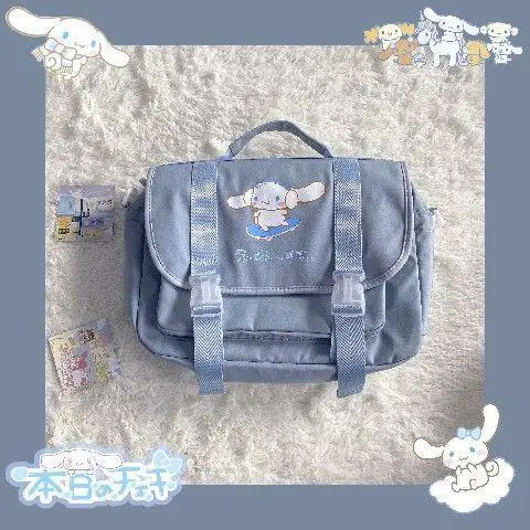 Sanrios Kuromi Cinnamoroll аниме милая вместительная японская сумка-мессенджер рюкзак Jk Wind мягкая женская сумка-униформа
Sanrios Kuromi Cinnamoroll аниме милая вместительная японская сумка-мессенджер рюкзак Jk Wind мягкая женская сумка-униформа
