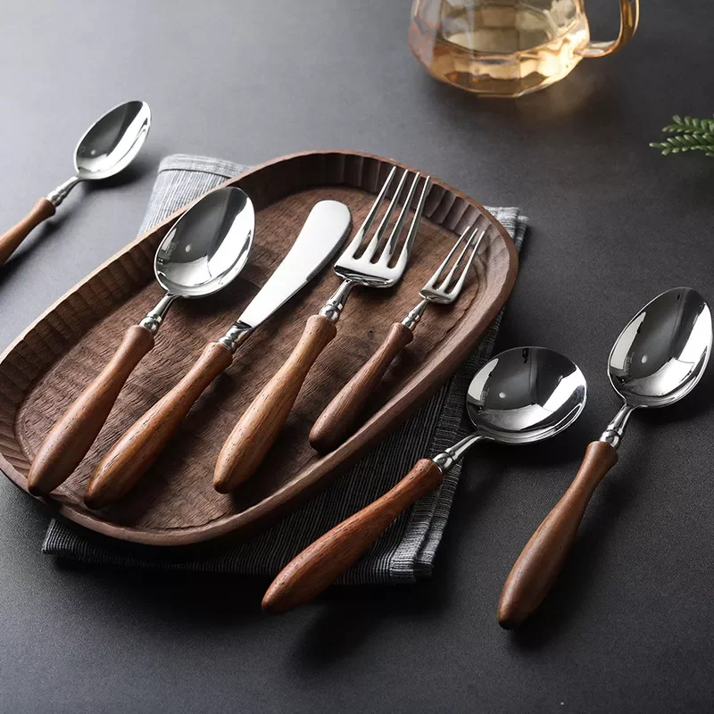 Stainless steel spoon teaspoon fruit fork rosewood handle steak knife and fork Western-style seven-piece set
Stainless steel spoon teaspoon fruit fork rosewood handle steak knife and fork Western-style seven-piece set