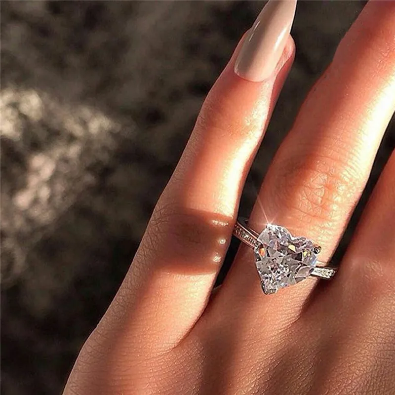 Trendy Crystal Zircon Heart Shape Rings For Women Shining Silver Color Engagement Wedding Jewelry Fashion Accessories Gift
Trendy Crystal Zircon Heart Shape Rings For Women Shining Silver Color Engagement Wedding Jewelry Fashion Accessories Gift