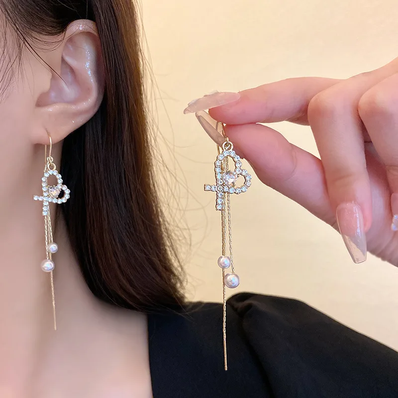 2023 New Trendy Love Long Pearl Anti Loss Earline Tassel Earrings Light Luxury Jewelry Wholesale for Women
2023 New Trendy Love Long Pearl Anti Loss Earline Tassel Earrings Light Luxury Jewelry Wholesale for Women