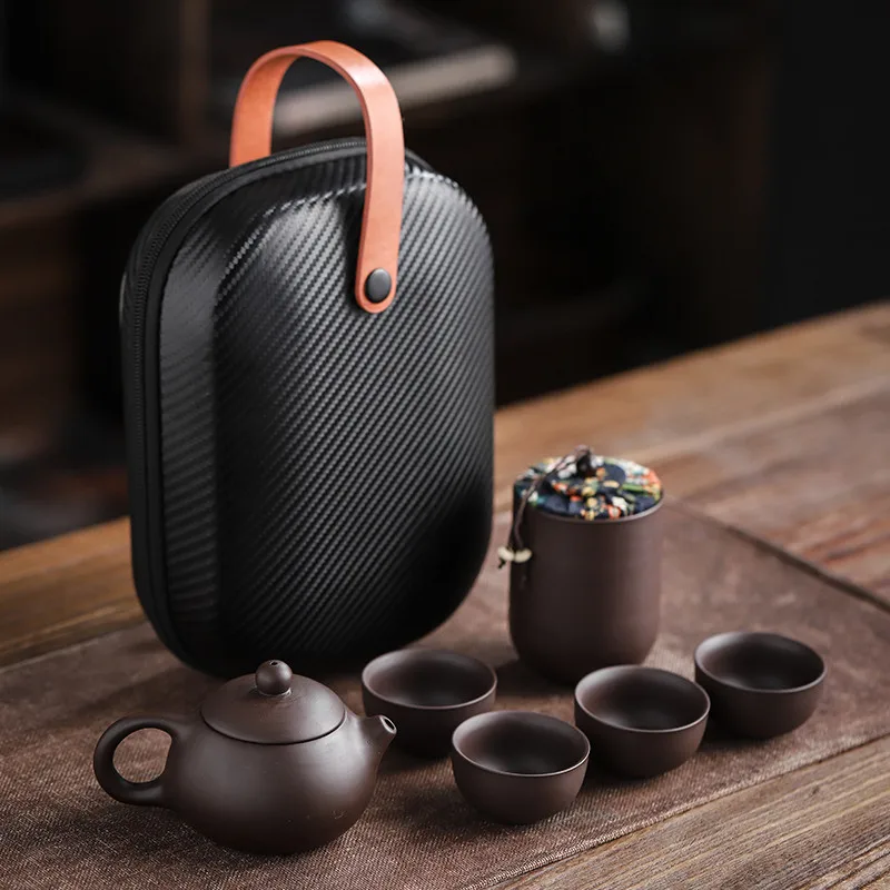 Purple Clay Teacups Ceramic Portable Tea Set Including 1 Pot + 1 Tea Caddy + 4 Cups Teapot Outdoor Travel Kung Fu Gaiwan Gifts
Purple Clay Teacups Ceramic Portable Tea Set Including 1 Pot + 1 Tea Caddy + 4 Cups Teapot Outdoor Travel Kung Fu Gaiwan Gifts