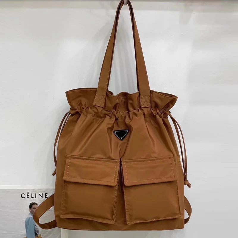 Preppy Style Backpacks For Women And Men Luxury Designer Handbag 2023 New In Nylon Multifunction Big Capacity Cloth Shoulder Bag
Preppy Style Backpacks For Women And Men Luxury Designer Handbag 2023 New In Nylon Multifunction Big Capacity Cloth Shoulder Bag