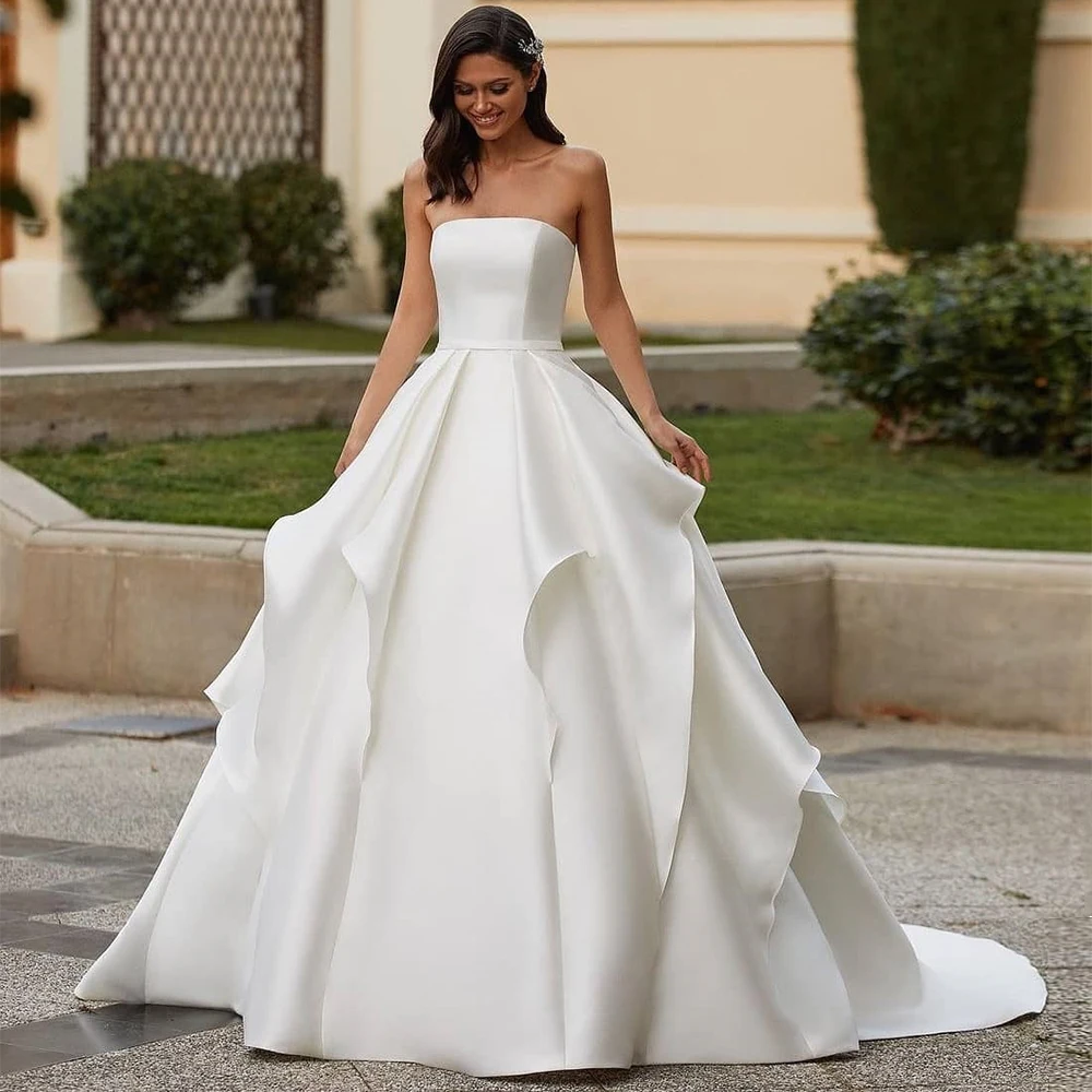 Ball Gown Wedding Dress 2022 White Satin Strapless Elegant Wedding Gown for Women Log Backless Sleeveless Belt Bride Dresses
Ball Gown Wedding Dress 2022 White Satin Strapless Elegant Wedding Gown for Women Log Backless Sleeveless Belt Bride Dresses