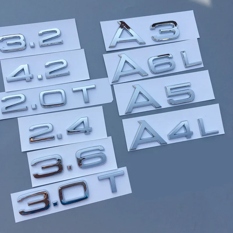 Серебристая хромированная эмблема для Audi 1,8 T 2,0 T 2,4 3,0 T 3,2 3,6 A3 A4 A5 A6L A7 A8L Q3 Q5 Q7, логотип-наклейка на багажник автомобиля с четырьмя колесами
Серебристая хромированная эмблема для Audi 1,8 T 2,0 T 2,4 3,0 T 3,2 3,6 A3 A4 A5 A6L A7 A8L Q3 Q5 Q7, логотип-наклейка на багажник автомобиля с четырьмя колесами